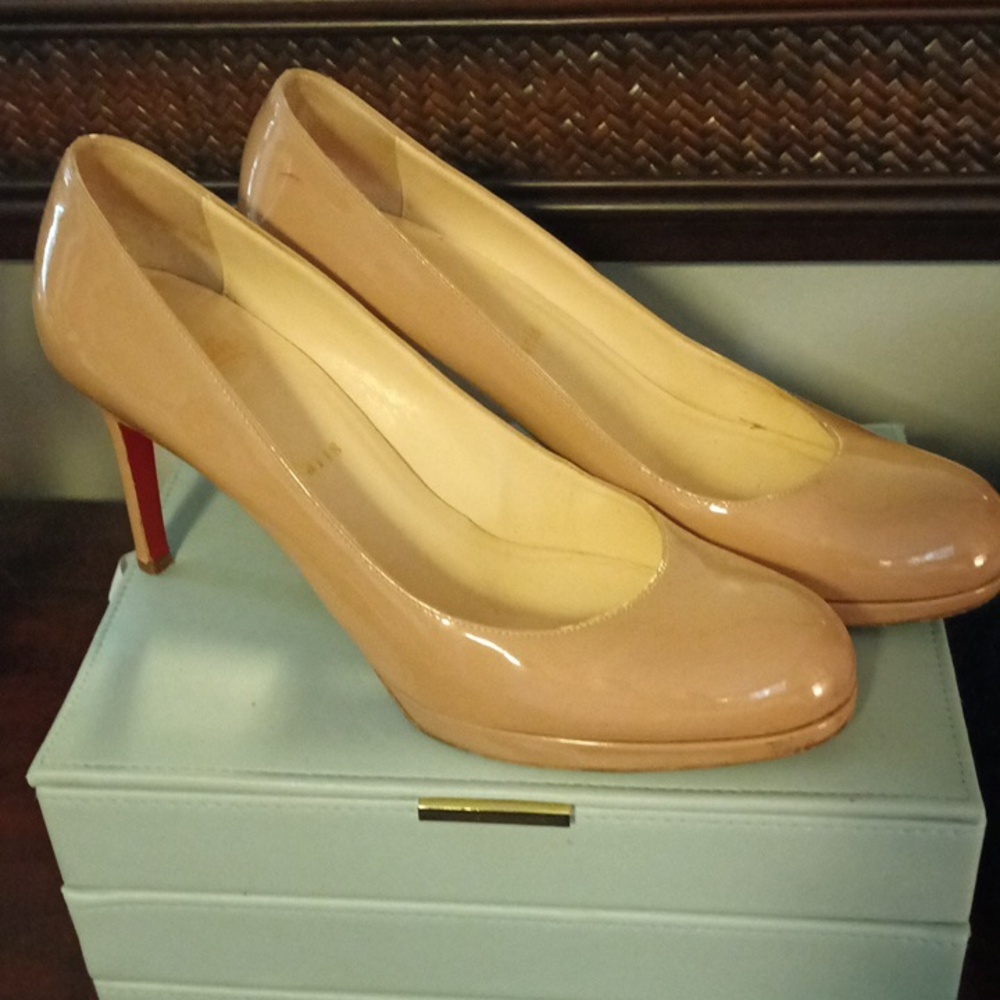 Nude Louboutin heels